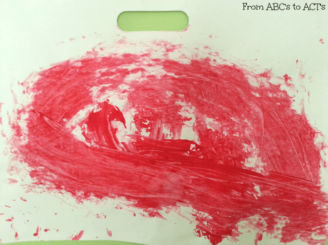 Red finger painting for red themed week in tot school.