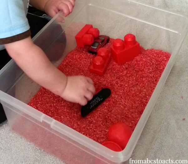 colored rice sensory bin for toddlers and preschoolers