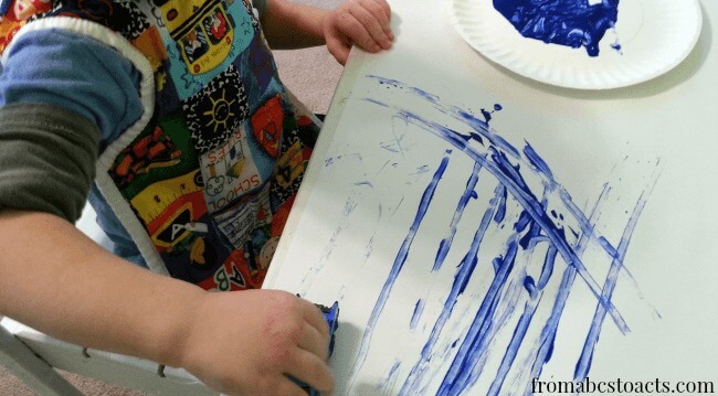 Painting with tire tracks for toddlers