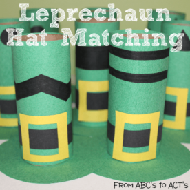 Leprechaun hat matching game made out of toilet paper rolls and construction paper.