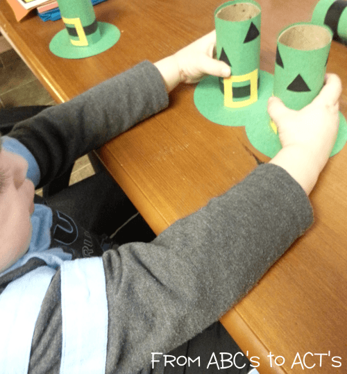 Nicholas finding matches using the leprechaun hat matching game for St. Patrick's Day!