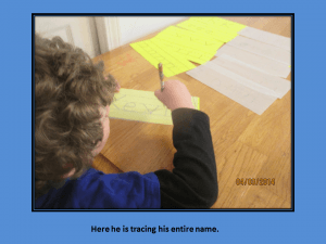Teaching a child the proper way to form letters so that they can write their name.