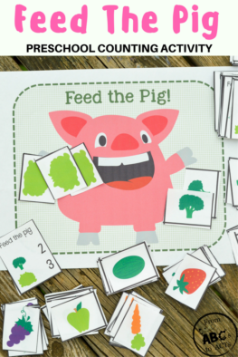 Planning a farm theme? This adorable feed the pig preschool counting game would make a great addition and is the perfect way to add a little math practice into your home preschool day!