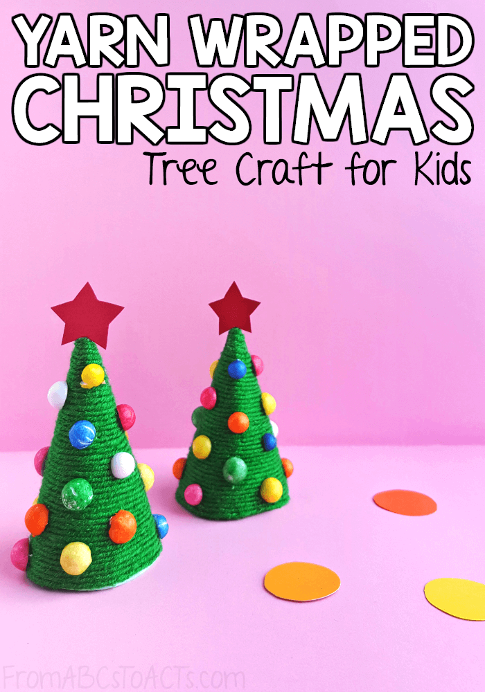 Give those fine motor skills a workout this holiday season with this yarn wrapped Christmas tree craft for kids! #FromABCsToACTs #ChristmasCrafts