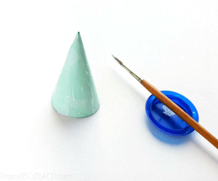 Add glue to the Christmas tree cone
