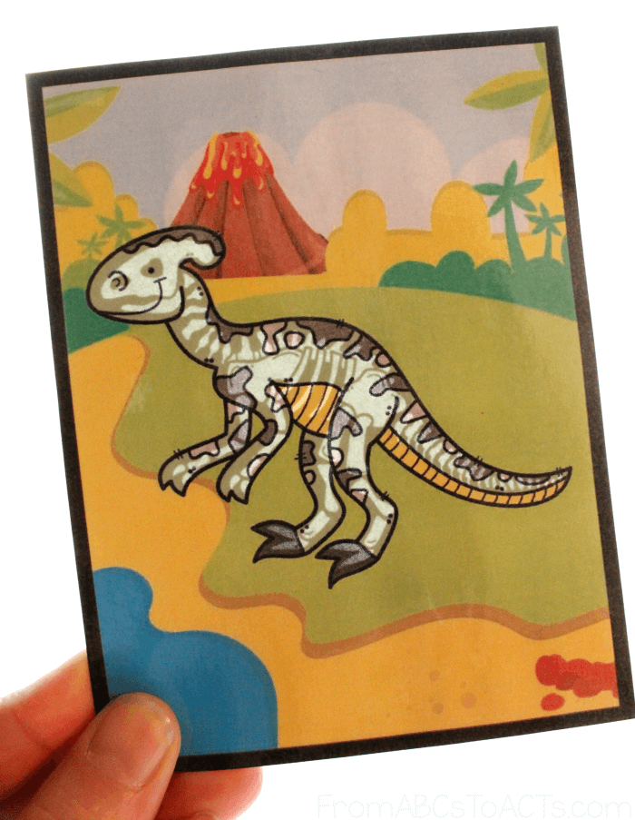 Dinosaur Flashlight Cards show Fossils with light